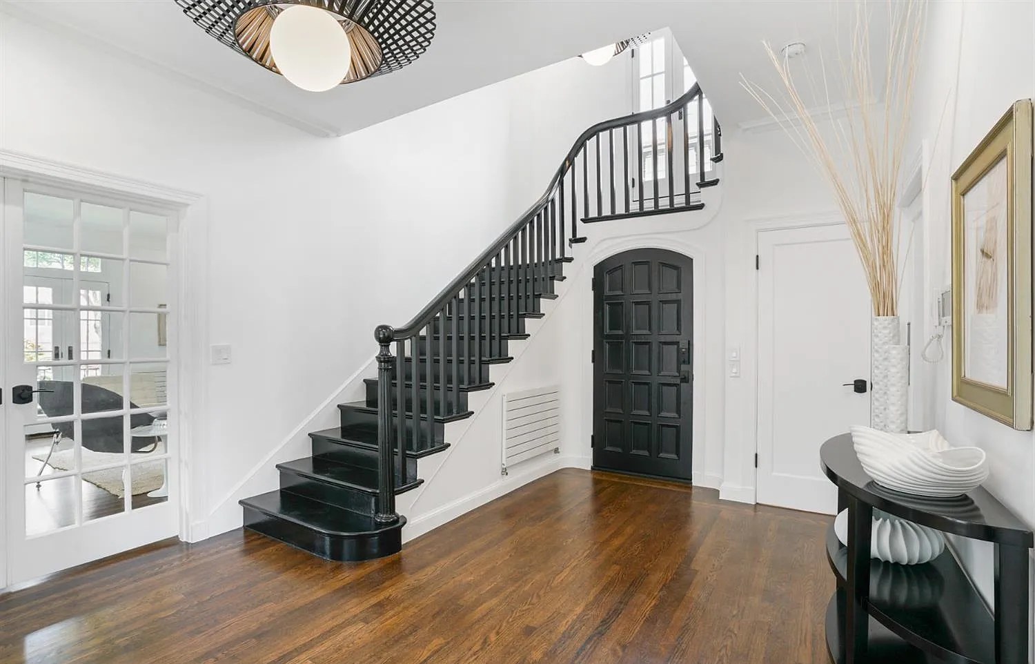 The entry hall and black staircase.